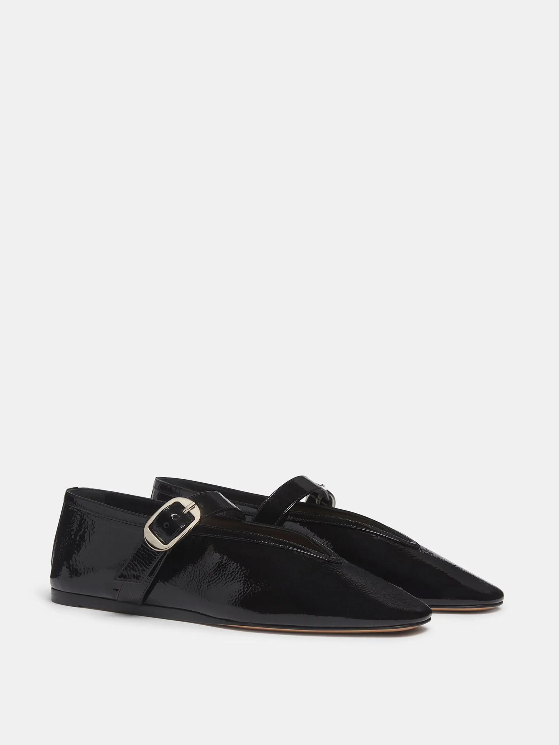 Black patent leather Stella slippers